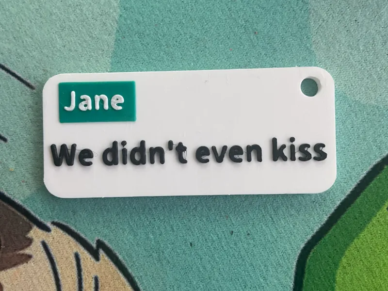 Heated Rivalry Kiss Keychain