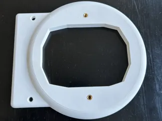 Offset smoke detector mounting plate