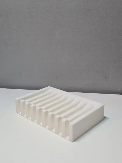 Soap tray with water drainage