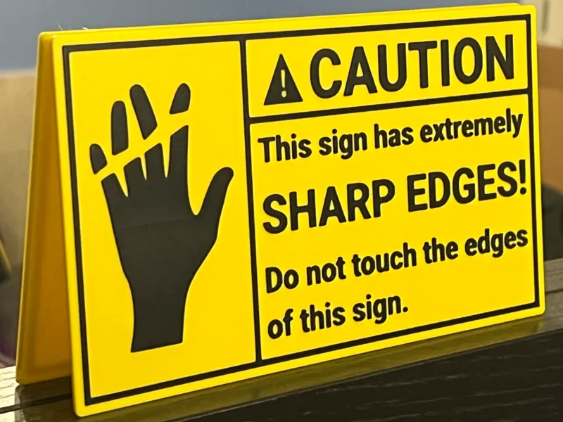 CAUTION This sign has extremely SHARP EDGES! 