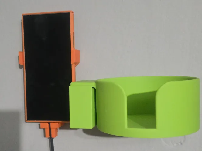 Mobile phone charger + mug holder