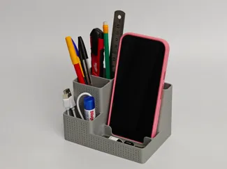 Pebble, a minimal desk organizer and phone stand