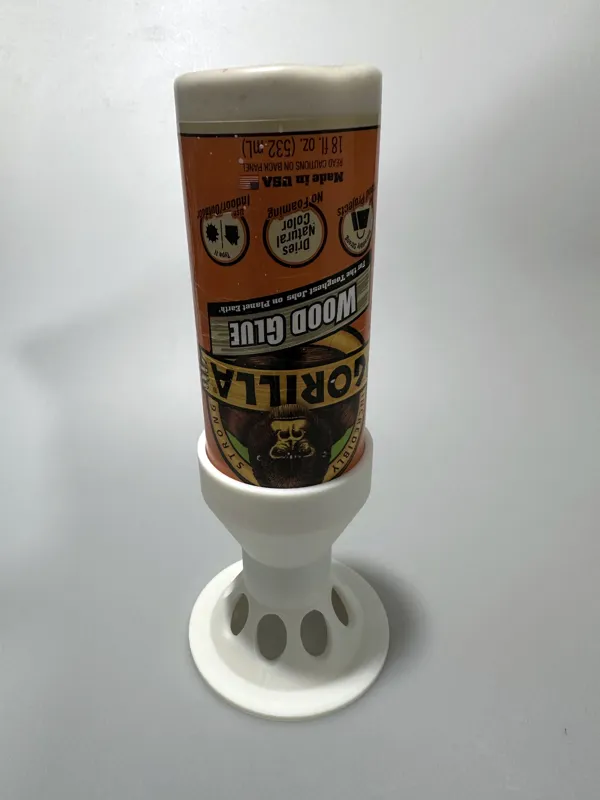 Support pour flacon de colle à bois