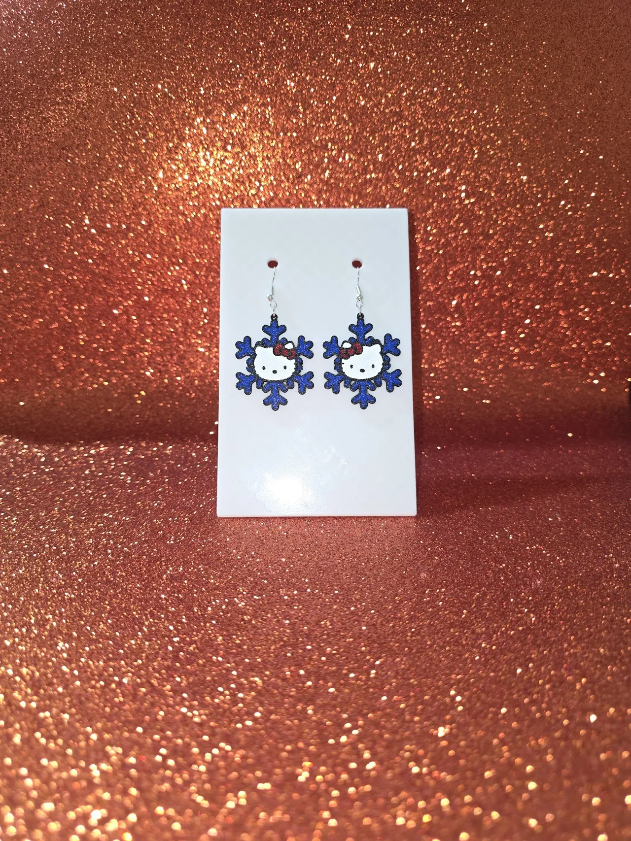 Hello Kitty snowflake earrings view 2