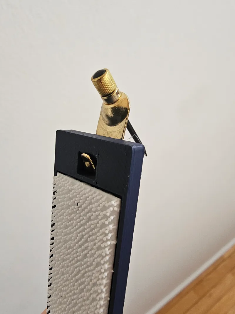 3M Command Strip adapter for drywall hook.
