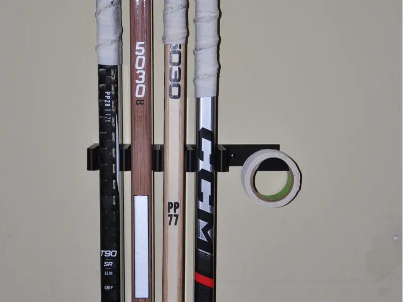 Hockey stick holder.