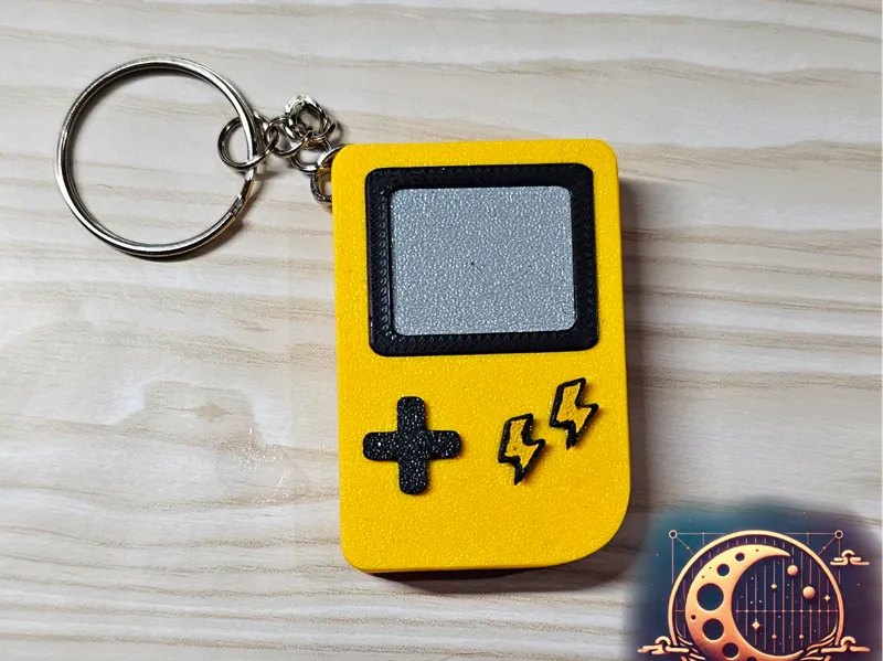 Retro Handheld Console Keychain - Electric Monster