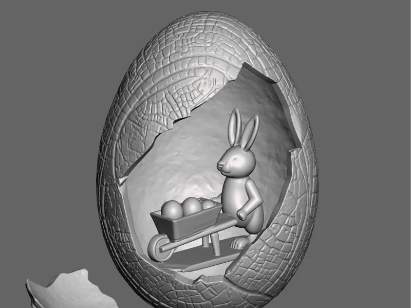 Easter egg with rabbit with wheelbarrow