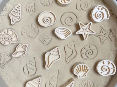 Shell stamps sensory play