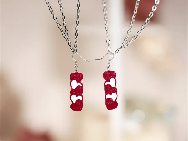 Cascading hearts charm earrings
