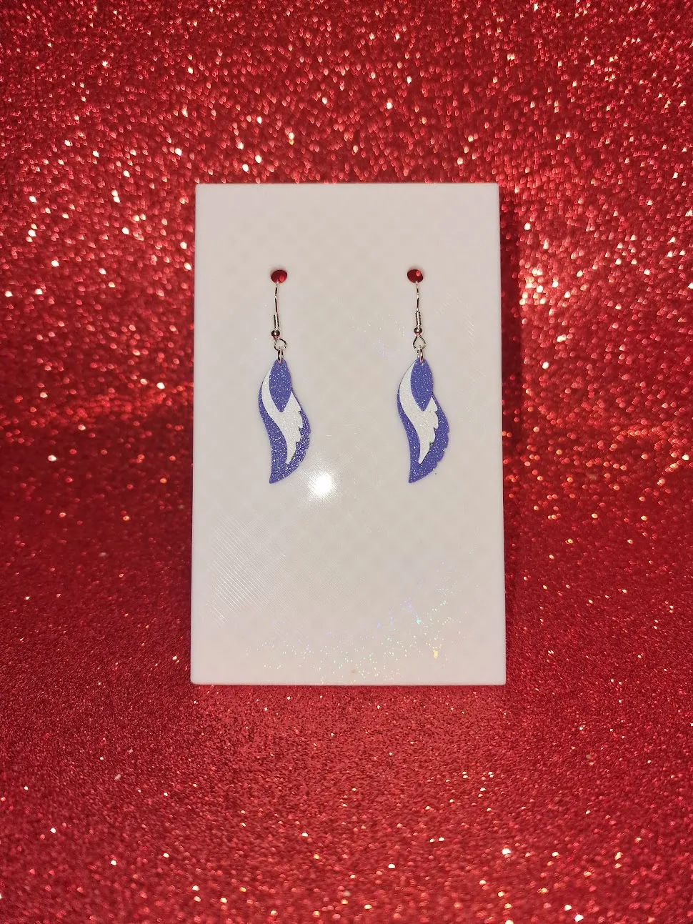 Purple and white feathers earrings view 2