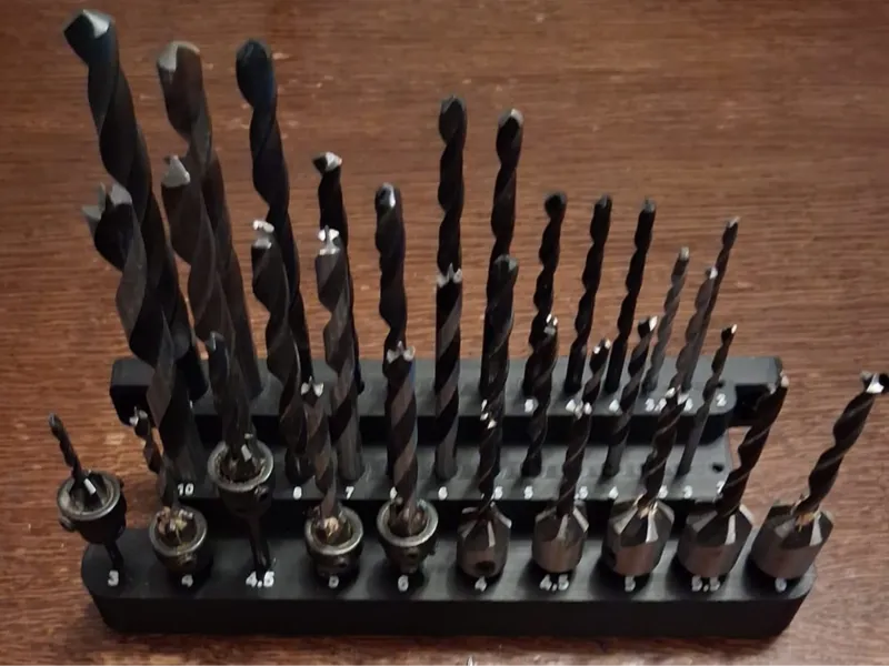 Drill bit holder for wall