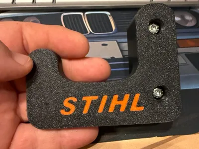 STIHL Wall Mount Battery Chainsaw and Hedge Trimmer