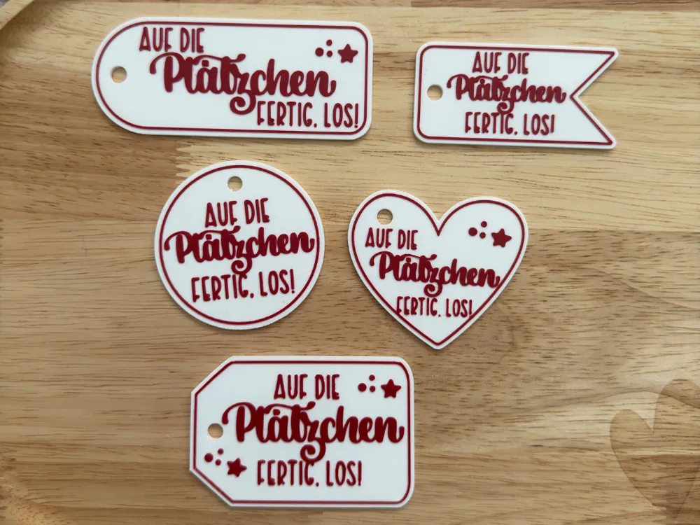 Letrero o emblema decorativo: Auf die Plätzchen, fertig, los!. Referencia del modelo original.