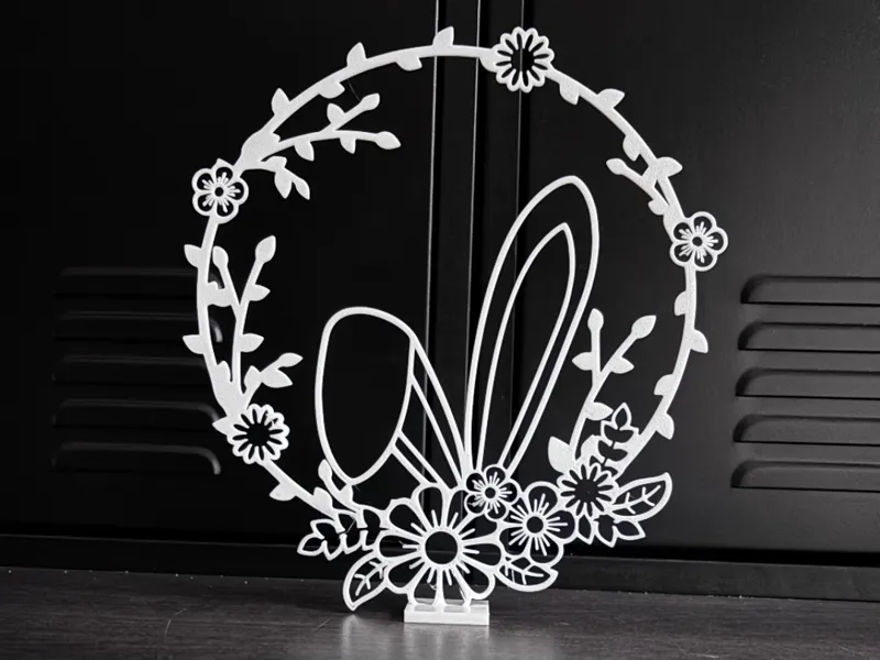Easter wreath with bunny ears and flowers