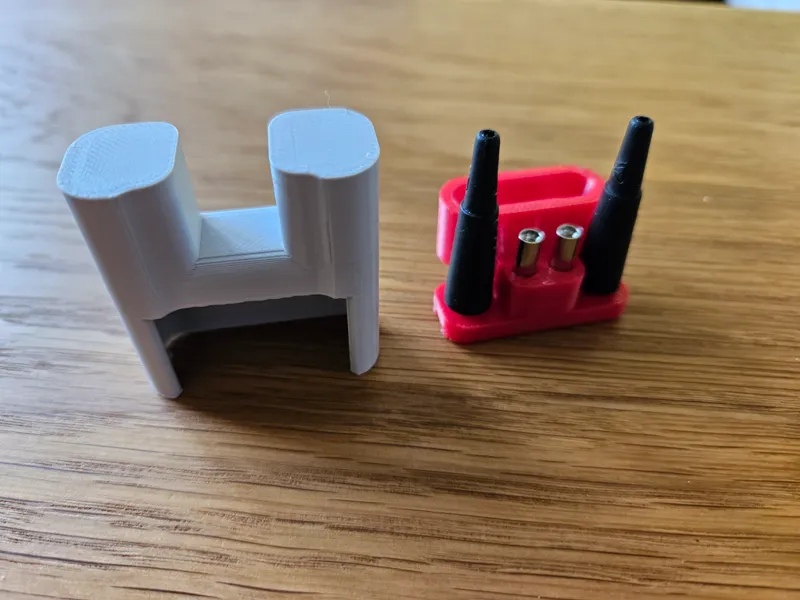 Two-pole meter accessory holder