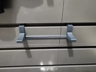 Slatwall Handgun Holder