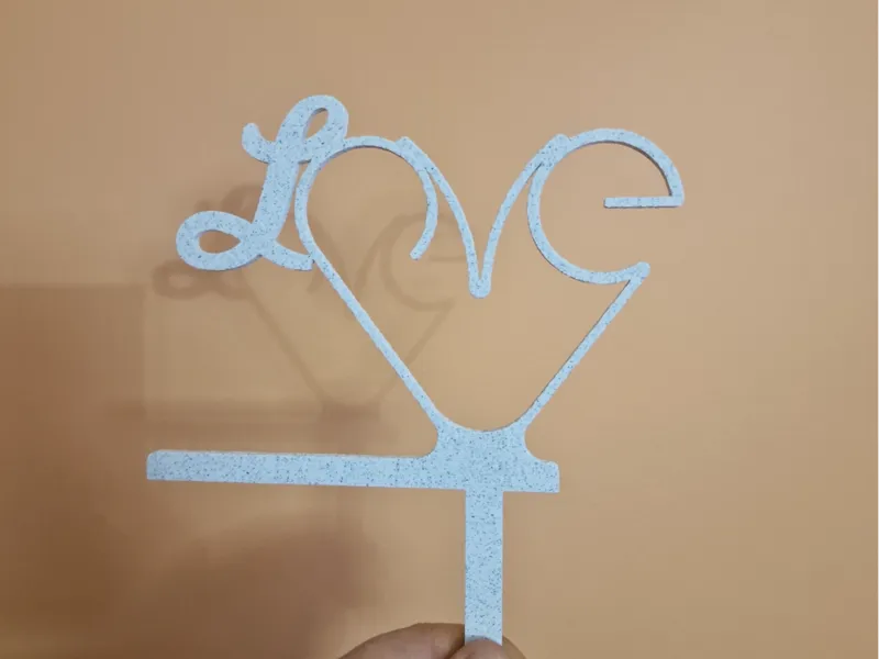A fancy “LOVE” sign — for flowers, a cake, 