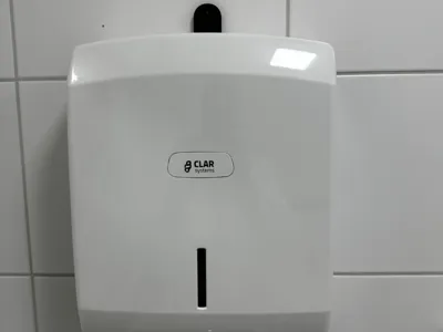 Paper dispenser key