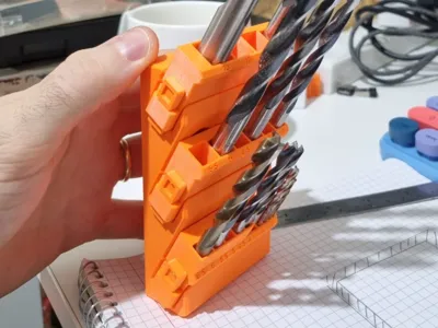 Wall mount drill bit holder