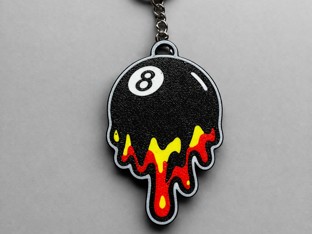 bold melting 8 ball keychain