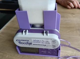 Holder for Flocare Infinity feeding pump & bottle