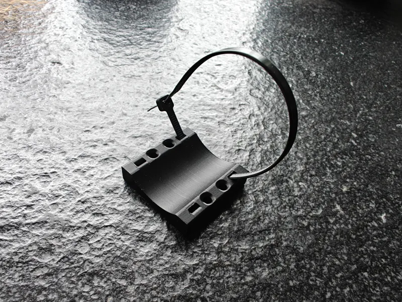 Cable bundle ziptie plate