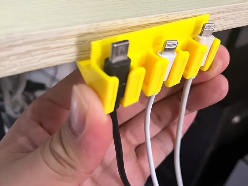 数据线收纳挂架；桌面数据线收纳器；桌面数据线收纳卡扣，