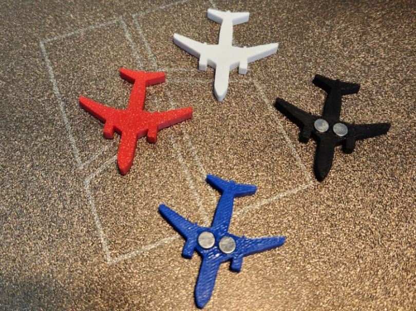 Silhueta de avião com imã