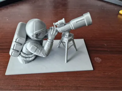 Astronaut with a telescope