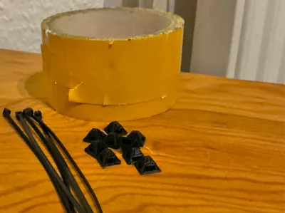 Cable holder with cable tie