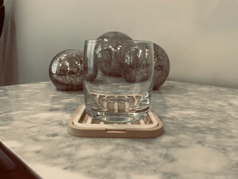 Compact, Lightweight Self-Draining Coaster