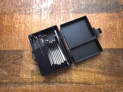 Latching box for tension wrenches