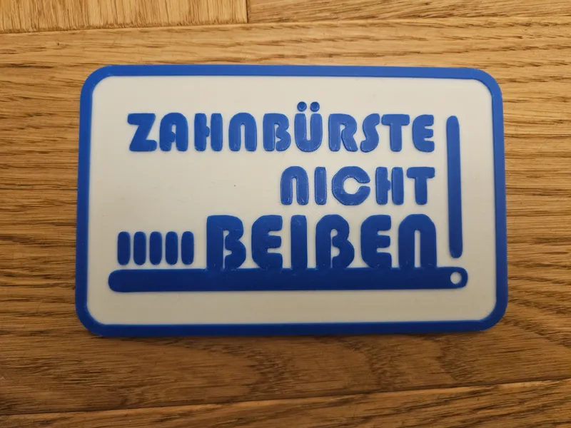 Zahnbürste nicht beißen! Schild