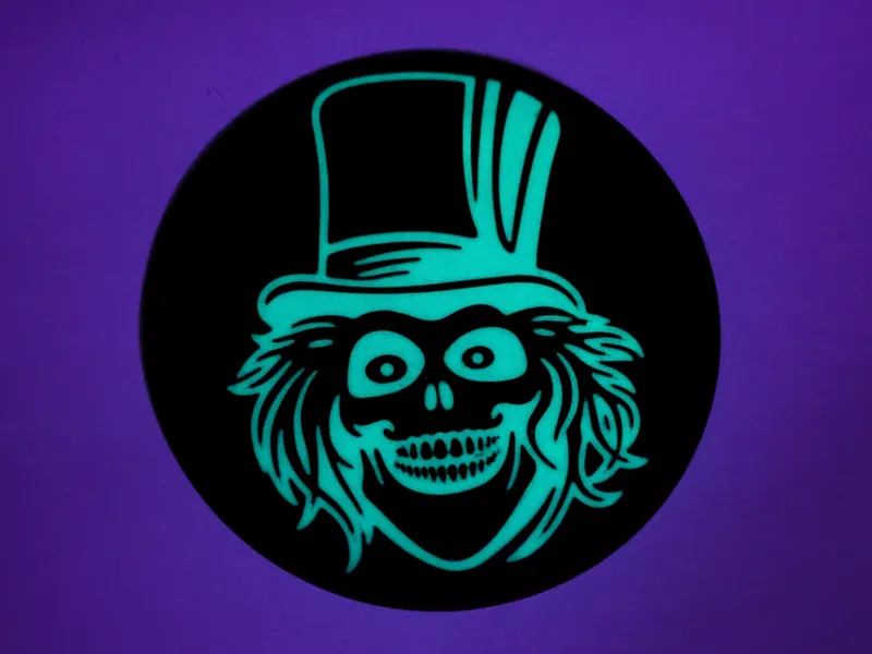 Disney's Haunted Mansion Coasters Glow in the dark