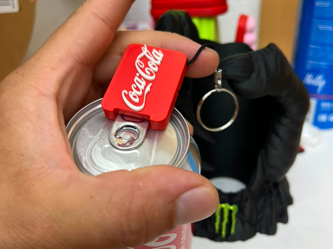 Abridor de latas coca cola - 1