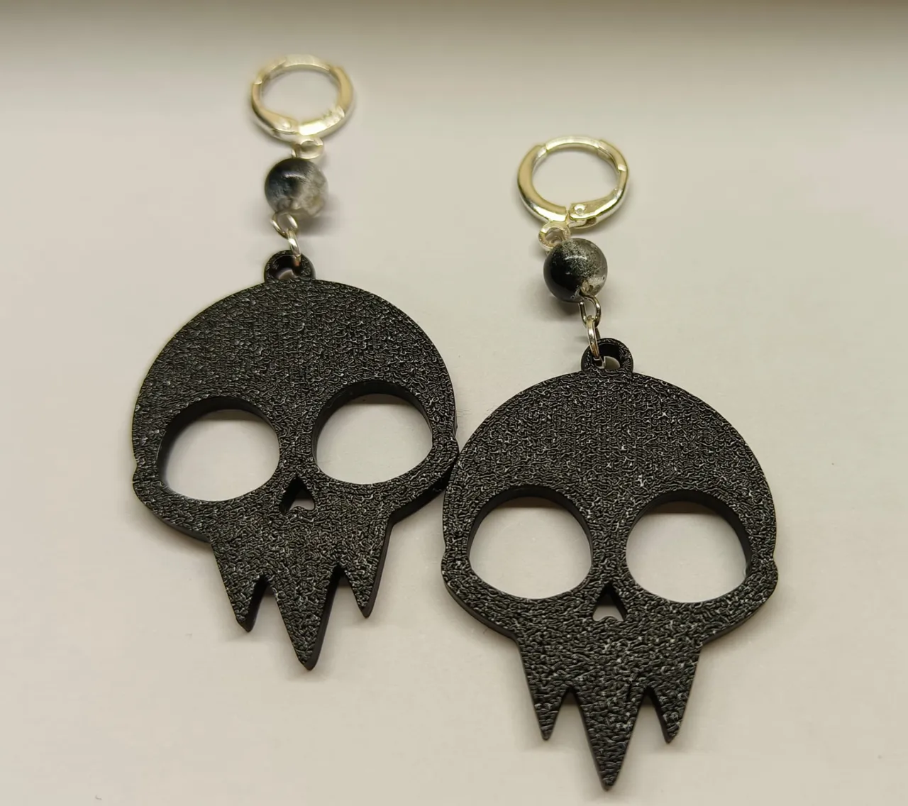 Skull earrings view 2