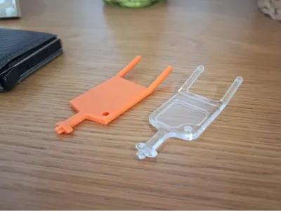 Toilet paper holder key