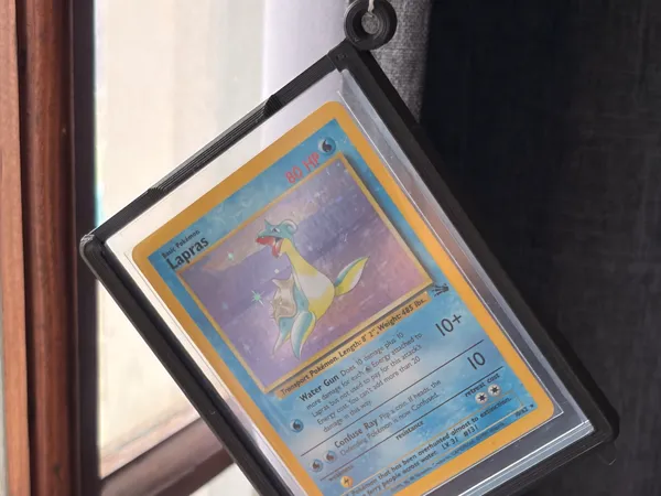 Porte-carte à collectionner — breloque