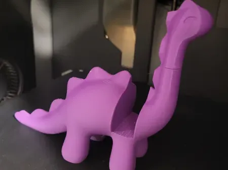 Cute Stylized Dinosaur Toy phone holder