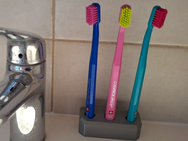 Toothbrush holder for curaprox
