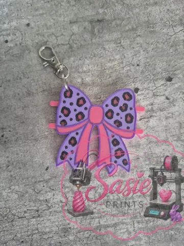 Accesorio para sujetar ligas de cabello: Cheetah Print Bow Hair Tie Holder Keychain — vista de referencia 5