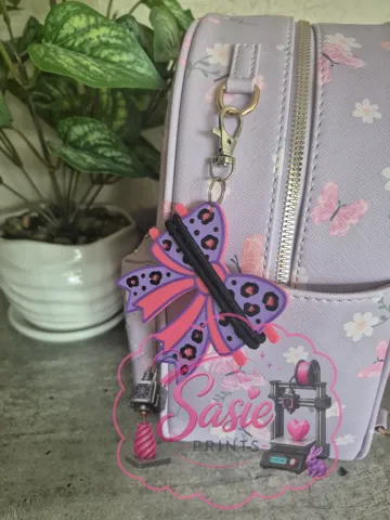 Accesorio para sujetar ligas de cabello: Cheetah Print Bow Hair Tie Holder Keychain — vista de referencia 3