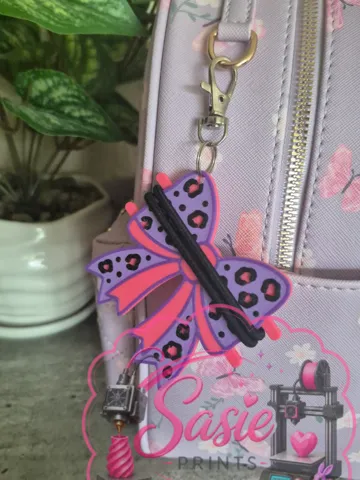 Accesorio para sujetar ligas de cabello: Cheetah Print Bow Hair Tie Holder Keychain — vista de referencia 2