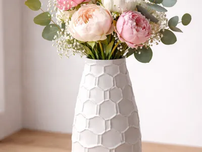 Elongated vase style raw finish H=130mm