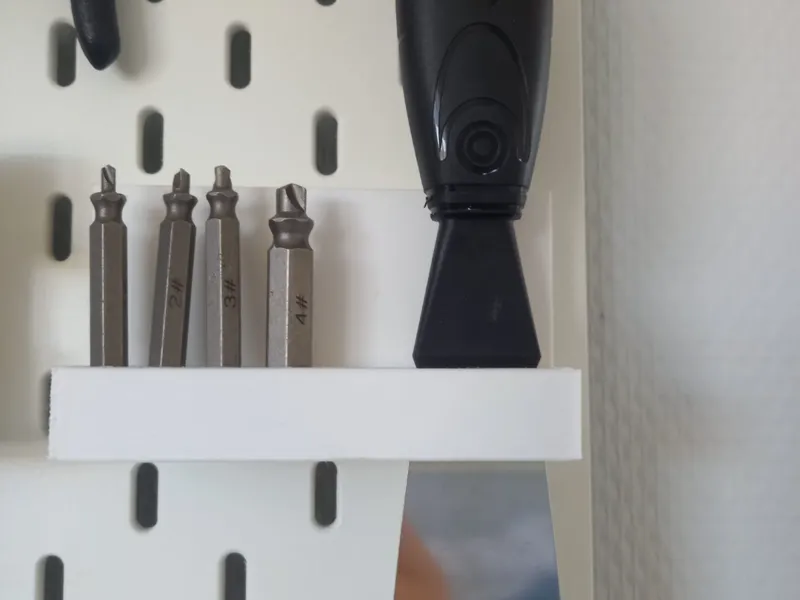 scraper and bit holder pegboard