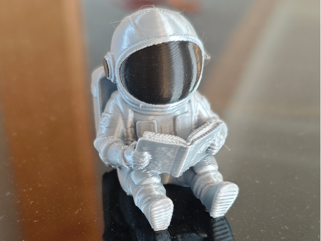 Luno cute astronaut reading customisable backpack