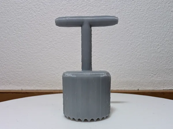Perce-trous pour paillage de jardin