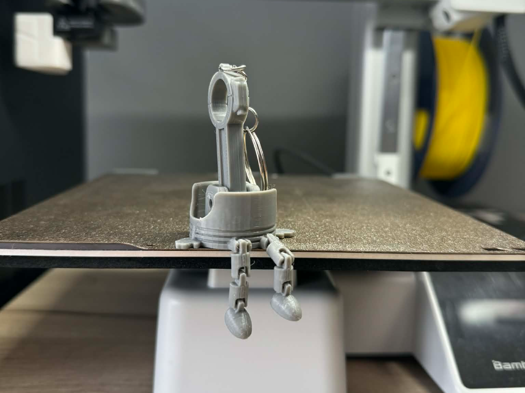 Pistone Buddy Keychain