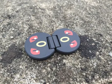 Objeto manipulable: Poke Prints Flip Fidget - Umbreon — vista de referencia 3
